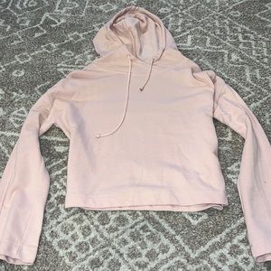 Cropped pink sweatshirt.
